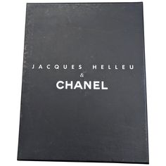 Chanel Coffee Table Book about Jacques Helleu, the creative image director for the house for many decades. Many images of famed campaigns and ideas including some of his work for other houses. 2006, Abrams. Hardcover with slipcover. 15" x 11.5" x 1.25". Chanel Coffee Table Book, Chanel Coffee, French Cocktails, Alber Elbaz, Vintage Chanel Bag, Chanel Suit, Chanel Brand, Coffee Table Book, Reference Book