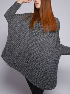 This beautiful over-sized sweater features simple style with fitted sleeves that makes you stylish and on trend. It is made of 100% eco cotton yarn in a beautiful charcoal/ dark grey color. No itch at all! It is a perfect item for Fall/winter that you can layering with tunic or shirt. Size: one size fit most. Hand wash only and lay flat to dry. I have other colors for this poncho. Pls. Check my shop for details: http://www.etsy.com/shop/MaxMelody?section_id=7175104 Thanks for stop by my shop! Oversized Knitted Gray Cardigan, Oversized Gray Knitted Cardigan, Oversized Gray Chunky Knit Cardigan, Oversized Gray Knitted Sweater, Gray Knitted Sweater For Fall, Gray Knit Sweater For Fall, Oversized Gray Textured Knit Sweater, Oversized Knit Gray Sweater, Cozy One Size Gray Sweater