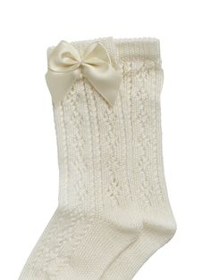 Step into luxury with Lullabi Italian knit knee socks in a lovely shade of cream, delicately adorned with a satin bow. Expertly crafted in Italy, these socks are the epitome of comfort and style. The addition of the satin bow adds a touch of sophistication and flair, making them a must-have accessory for those who appreciate both fashion and cozy warmth. Shipping and Returns This product can be returned/exchanged within 20 days of receiving the item. All orders are dispatched from our Sydney, Au Cream Knee-high Socks For Stocking Stuffers, Elegant Knee-high Stockings, Elegant Knee-high Stockings For Spring, Elegant Fitted Beige Stockings, Elegant Formal Winter Socks, Beige Knee-high Socks For Stocking Stuffers, Classic Fitted Beige Socks, Elegant Knee-high Socks For Winter, Elegant Knee-high Socks For Spring