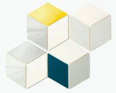 four cubes with different colors and shapes