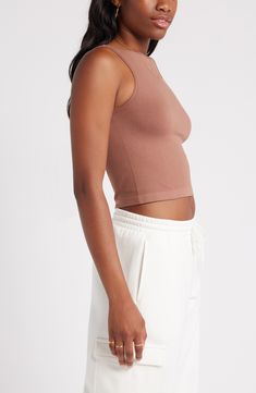 A high-necked style and a smooth, seamless fabrication make this knit tank an easy fave. 17 1/2" length (size S/M) Ballet neck 95% nylon, 5% spandex Machine wash, line dry Imported Not available for sale and shipment to Germany High Neck Tank, Knit Tank, Knit Tanks, Topaz, Not Available, High Neck, Top Brands, Ballet, Germany