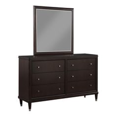 a brown dresser with a mirror on top of it and some drawers in front of it