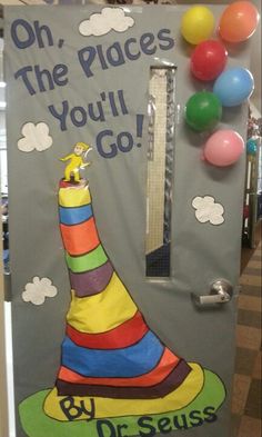 the door to dr seuss's classroom is decorated with balloons