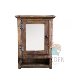 an old wooden cabinet with mirror on top