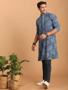 Vastramay Men's Blue Dot Printed Denim Kurta Elevate your ethnic style with this trendy blue dot printed denim kurta. It features a mandarin collar, long sleeves, and a button placket for a comfortable and stylish fit. Pair it with a white pyjama or fitted jeans for a complete look. Key Features Blue colored dot printed denim fabric Straight knee length kurta Mandarin collar Long sleeves with button cuffs Button placket closure Side slits Specifications Sleeve Length -Full Sleeves Shape - Straight Top Length - Knee Length Neck - Mandarin Collar Material & Care Top Fabric - Cotton Dry Clean Legal Disclaimer: The product is guaranteed to be 100% genuine. Product images are for illustrative purposes only. Images/packaging/ labels may vary from time to time due to changes made by the manufactu Kurta And Jeans Men, Blue Casual Straight Kurta, Casual Blue Kurta For Festive Occasions, Blue Casual Kurta For Festive Occasions, Casual Bandhani Print Kurta For Festive Occasions, Casual Bandhani Print Festive Kurta, Casual Blue Festive Kurta, Blue Casual Festive Kurta, Blue Festive Casual Kurta