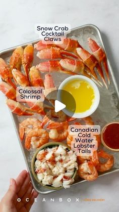 a person holding a tray with shrimp and other foods on it, labeled in words