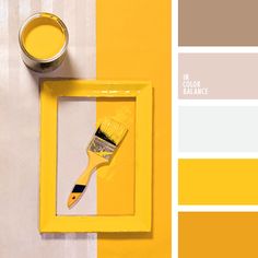 a yellow and gray color scheme with a paintbrush