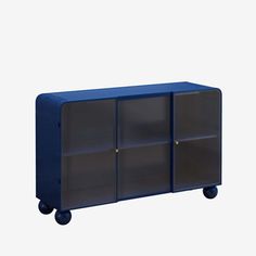 a blue plastic storage cabinet on wheels with two doors and three shelves in the middle