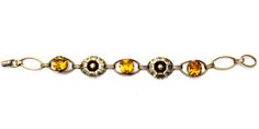 Antique Bracelet - This is a 12K gold filled over sterling silver citrine rhinestones flower bracelet. It is signed PR. ST. CO for Providence Stock Co., hallmarked 1/20 12K on Sterling, 6.25" long, slightly over .5" wide, weighs 8.6 grams. Formal Yellow Gold Jeweled Bracelets, Yellow Gold Jeweled Bracelets For Formal Occasions, Yellow Gold Jeweled Bracelet For Formal Occasions, Jeweled Yellow Gold Bracelets For Formal Occasions, Classic Yellow Bracelet, Formal Yellow Metal Jewelry, Yellow Costume Jewelry For Formal Occasions, Formal Gold Jeweled Bracelets, Gold Jeweled Bracelets For Formal Occasions