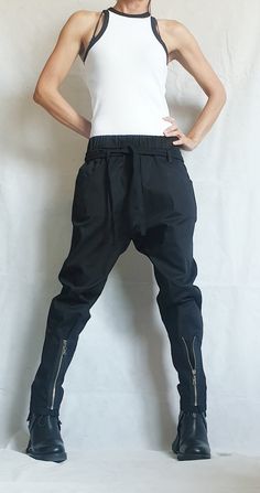 "Extravagant Women Harem Pants, Tight Zipper Pants, Women Baggy Trousers, Cyberpunk Trousers, Black Loose Pants, Gothic Pants ❤️ Extravagant designs and high quality fabrics! ❤️ Materials & Care Textile, Cotton Polyester Hand wash at low temperatures. Do not machine dry. Do not iron. Do not dry clean! ❤️ Sizing We can make your piece from XS to 5XL! Everything in the shop can be also made according to your measures free of charge! ❤️ Shipping ✈ Ready to ship The time I need to prepare an ord Zipper Pants Women, Black Loose Pants, Steampunk Shoes, Gothic Pants, Zipper Pants, Baggy Trousers, Steampunk Clothing, Edgy Style, Pantalon Large