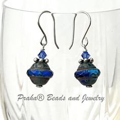 Sweet navy blue and copper Czech glass Saturn earrings you'll want to wear every chance you get. They are fairly lightweight. Made with Czech pressed glass beads. They are translucent navy blue, with a Picasso finish. Navy And Copper, Beads Earrings, Prague, Beaded Jewelry