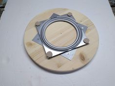 a circular object made out of wood and metal