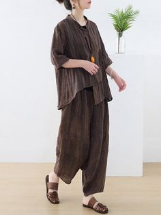 Sku CY-!89082 Material >90%Linen Style Loose , Wide Leg , Irregularity Feature Buttoned , Tied , Pleated , Solid Color Neckline Round-neck Occasion Casual , Vacation , Vintage Seasons Spring , Summer , Autumn Type Two Pieces Set Top&Bottom Suits,Tops,Bottoms Color COFFEE,BLACK,APRICOT Size FREE SIZE Please consult the size chart we provide for this item's measurements to help you decide which size to buy.Please note: There may be 1-3cm differ due to manual measurement.CMINCH Top Bust Shoulder Sl Summer Workwear Sets In Brown, Brown Wide Leg Sets For Spring, Beige Linen Wide-leg Harem Pants, Linen Wide-leg Harem Pants With Pockets, Loose Fit Linen Wide-leg Harem Pants, Bohemian Linen V-neck Tunic, Oversized V-neck Lagenlook Top, Sleeves Blouse, Coffee Black