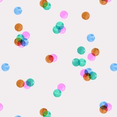 multicolored circles are scattered on a white background