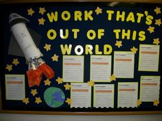 a bulletin board with a rocket on it that says work that's out of this world