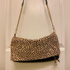 Leather And Calf Hair Crossbody Bag. Fold Over Style With Zipper. Excellent Condition, Looks Brand New. Dimensions: 12 X 8 Inches Leopard Print Leather Bag With Zipper, Versatile Brown Shoulder Bag With Chain Strap, Chic Leopard Print Satchel Shoulder Bag, Chic Leopard Print On-the-go Bag, Leather Shoulder Bag With Adjustable Strap In Leopard Print, Brown Chain Strap Satchel For Everyday Use, Leather Satchel Shoulder Bag In Leopard Print, Leather Shoulder Bag In Leopard Print For Everyday, Leopard Print Leather Satchel Shoulder Bag