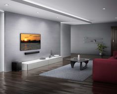 a living room filled with furniture and a flat screen tv mounted to the side of a wall