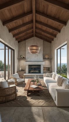 a living room filled with lots of furniture next to a fire place in a building