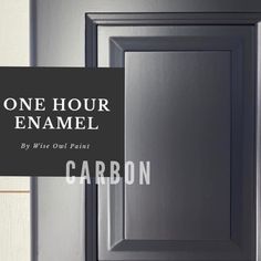 a black door with the words one hour enamel painted on it and an image of carbon