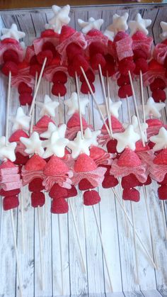 red, white and blue cupcakes are arranged on sticks in the shape of stars