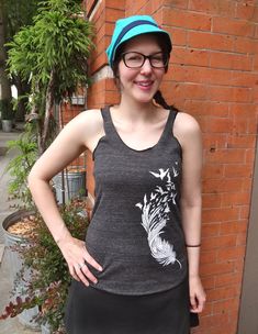 "This Bird Feather Womens Graphic Boho Tank Top makes a special gift for her. A tri blend cotton bird shirt that's soft and comfy, its a perfect lounge top, Yoga top, or work-out tank. Come fly away with me! Instead of the traditional BIRD with feathers, this is a FEATHER with birds! This graphic tank represents metamorphosis, growing, changing, and flying away from the nest. An inspirational and clever tank for you to wear on your next adventure. Tank features a flattering a-line shape, a sligh Comfortable Workout Tops For Spring, Comfortable Spring Workout Tops, Comfortable Cotton Workout Tops, Gray Casual Yoga Top, Comfortable Cotton Yoga Tops, Tri-blend Cotton Workout Tops, Feather Tank Top, Birds Design, Bird Feather