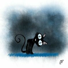 a black monkey with big eyes standing in the grass