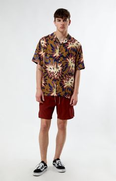 Embrace the essence of summer with our PacSun Printed Camp Shirt. Boasting a collared neckline, short sleeves, and a lightweight feel, it's the epitome of laid-back comfort. Featuring a custom pattern and button closures, this shirt brings a touch of vacation vibes to any outfit.


	Collared neckline
	Short sleeves
	Standard fit
	Button closures
	Lightweight
	Custom pattern
	100% Viscose
	Machine washable
	Model is wearing size medium
	Model Measurements: 6'1” Height, 31” Waist, 33” Inseam Collared Summer Camp Shirt For Vacation, Multicolor Camp Collar Tops For Summer, Relaxed Fit Short Sleeve Top For Warm Weather, Short Sleeve Camp Shirt For Beach In Summer, Collared Short Sleeve Shirt For Summer Vacation, Summer Collared Camp Shirt For Beach, Hawaiian Short Sleeve Tops For Summer, Summer Camp Shirt For Beach With Collar, Hawaiian Short Sleeve Summer Tops