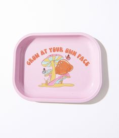 a pink tray with an image of a dog on it and the words grow at your own pace