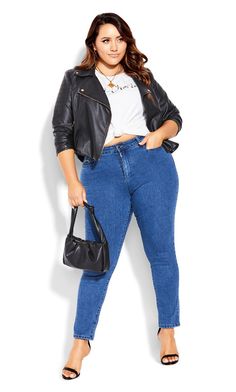 Create a sleek and svelte casual look with our blue wash Harley Buckle Detail Jean! A trending skinny cut flatters and elongates the leg, while expert tailoring offers the perfect shape for an hourglass figure.  Key Features Include:  - The perfect fit for an hourglass body shape  - Skinny leg  - Single button & fly closure  - Belt looped waistline  - Functional 4 pocket denim styling  - Mid rise  - Ankle grazer  - Side buckle detail  - Stretch denim fabrication  - High denim fiber retention to maintain shape  - Signature Chic Denim hardware throughout zips, buttons, and rivets  For an upstyled evening look, team with a sparkly bodysuit and some strappy heels. Plus Size Levis, Plus Size Leather Jeans, Barrel Jeans Plus Size, Curvy Denizen Levis, Sparkly Bodysuit, Hourglass Body Shape, Denim 24/7 Plus Size Clothing, Denim Chic, Plus Size Jeans