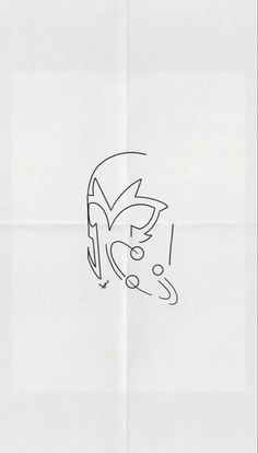 a drawing of a face on a piece of paper