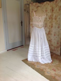 "amazing silk cotton camisole, in excellent condition. this camisole will be a beautiful summer top or wedding top.. the ribbons are pure silk with a woven pattern. the lace is Chantilly lace measurements: bust 86 cm 34\" waist 76 cm 30\" length 40 1/2 cm 16\" this top will be shipped with insurance" Underbust Lace Bodice With Lace Trim, Sleeveless Lace Bodice Summer Corset, White Lace Bodice With Lace Trim, Summer Lace Corset With Lace Top Detail, Summer Lace Corset With Lace Trim, White Sleeveless Lace Bodice, Lace Underbust Camisole With Lace Trim, Summer Lace Corset With Feminine Style, Summer Corset With Lace And Fitted Bodice