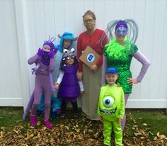 a group of people in costumes standing next to each other