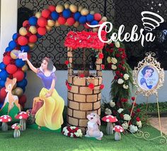 a birthday party with balloons and decorations for the princess's first birthday at disney world