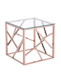 a glass and metal coffee table on a white background