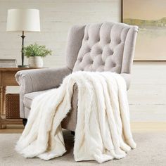 a chair with a blanket on top of it