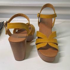 Brand New Without Tags. These Adorable Aeo Sandals Have Never Been Worn. They Have An Approximate 1-Inch Platform Height And 3.5 Inch Total Height. Color Is A Darker Yellow- The Shade Of Yellow Seen In The Pictures Is Exactly What The Color Looks Like In-Person. Bundle To Save! Casual Ankle Strap Clogs Medium Width, Yellow Platform Clogs For Summer, Casual Open Heel Wedge Sandals With Heel Loop, Casual Heels With Heel Strap, Casual Yellow Wedge Sandals With Cushioned Footbed, Casual Yellow Platform Clogs, Yellow Clogs With Cushioned Footbed For Spring, Yellow Casual Clogs With Wooden Heel, Casual Yellow Clogs With Wooden Heel