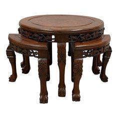 Look at this beautiful carved Coffee Table set. It is made from solid Rosewood with beautiful burl wood on the top. It has traditional Chinese carving works all around sides with tiger legs. Also, there are 4 matching stools nested underneath the coffee table. Look at the pictures, you can see the hand-crafted with exquisite detail on it with minor blemishes due to age but definitely quality workmanship you don't find anymore today! You will find it is truly antique and collectible stuff when yo Nesting Stools, Asian Coffee Table, Chinese Tea Table, Carved Coffee Table, Table With Stools, Coffee Table With Stools, Traditional Coffee Table, Coffee Table Sets, Tea Tables