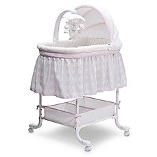 a baby crib that is on wheels