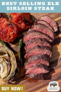 sliced meat and vegetables on a cutting board