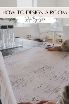 two people sitting at a table with blueprints on it and the words how to design a room