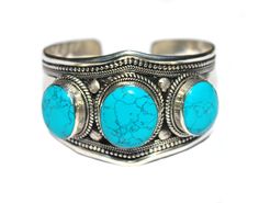 PRICES MAY VARY. Beautiful & high quality, blue Stabilized-Turquoise bracelet for men & women. ADJUSTABLE to fit mostly any wrist size. Item Length - End to End - 7.5 inches Durable band made of Argentium plated Stainless Steel & Alloy Trendy & timeless, multi-stone bracelet for all occasions. Good for everyday wear. The perfect surprise gift giving for girlfriend, boyfriend, mom, dad, wife, husband, daughter, son, friend, mother-in-law, father-in-law, colleague, or anyone else. Bohemian tribal Nepali Jewelry, Tibetan Jewelry, Jewelry Antique, Jewelry For Men, Bracelet Boho, Bleu Turquoise, Bracelet For Men, Surprise Gift, Girlfriend Boyfriend