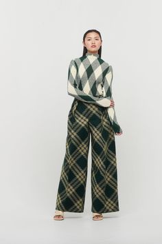 Under the creative direction of Daniel Lee, the brand epitomises modern British luxury and is known for its iconic house codes and signature pieces. This pullover style lightweight sweater is a sheer rib-knit with argyle check. Burberry Trousers, Turtleneck Under, Charlotte Chesnais, Shirts For Leggings, Scarf Shirt, Pleats Please Issey Miyake, Cape Coat, Jean Leggings, Jean Paul Gaultier