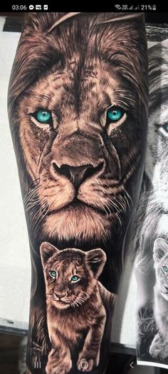 a lion with blue eyes and a cat on his leg is shown in this tattoo design