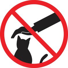 a black and white sign with a cat in it's hand next to a knife