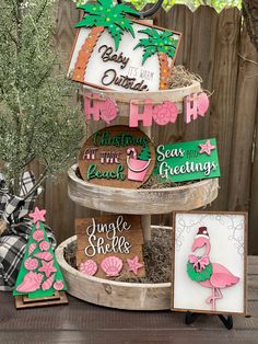 three tiered trays filled with cards and decorations