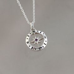 Love's Compass February birthstone necklace is the perfect gift for anyone embarking on one of life's adventures. One side has a faceted natural amethyst set in the traditional cardinal points of the compass while the reverse spells out the word love. Sterling Silver Amethyst Size: 15 mm, 16-inch chain with a 2-inch extender. Ring sizing can be tricky. If your ring doesn't fit, simply send it back and I will send you another size.   All of our sterling silver jewellery comes beautifully packaged Spiritual Birthstone Jewelry For Personalized Gift, Personalized Purple Jewelry For Gifts, Engraved Amethyst Spiritual Jewelry, Amethyst Charms Jewelry Gift, Amethyst Birthstone Jewelry As A Gift, Amethyst Charms Jewelry For Gift, Spiritual Engraved Amethyst Jewelry, Gift Amethyst Charms Jewelry, Personalized Purple Necklace Gift