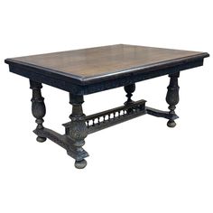 an old wooden table with ornate carvings on the legs and top, isolated against a white background