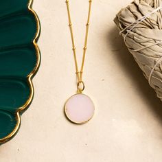 Genuine Pink Opal Round Circle Disc pendant on 14k gold filled satellite chain perfect for layering / Gold jewelry Gifts for Mom, her, bff Size: 20mm diameter Note that due to the handmade nature of these genuine stones, measurements are approximately and might vary slightly for each stone. Chain: Available in 18, 20 and 24 inches (chose from menu) Chain Material: 14k Gold Filled with spring ring clasp. Bail of the pendant is Vermeil Gold (14k gold plated over Sterling Silver) Stone: Genuine Pin Gold Rose Quartz Round Pendant Necklace, Gold Rose Quartz Round Pendant Jewelry, Gold Minimalist Charm Necklaces With Natural Stones, Minimalist Gold Charm Necklaces With Natural Stones, Minimalist Gold Charm Necklace With Natural Stones, 14k Gold Filled Satellite Chain Charm Necklace As Gift, Layered Gold Jewelry, Gold Jewelry Gift, Gold Disc