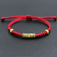 Tibetan Buddhist Rope Woven Bracelet P R O D U C T I N F O : Ethnic style gold circle black or red rope thread woven bracelet. Adjustable rope bracelet Casual Gold Jewelry For Festivals, Casual Gold Friendship Bracelets For Festival, Casual Gold Bracelets For Festivals, Gold Braided Beaded Bracelets As Gift, Traditional Gold Bracelet With Sliding Knot, Gold Braided Beaded Bracelet For Gift, Casual Gold Braided Bracelet With Adjustable Cord, Casual Handmade Gold Friendship Bracelets, Casual Gold Braided Bracelet With Sliding Knot