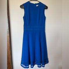 Like Brand New Dress, Size 2. Open To Offers And Any Questions!! Calvin Klein A-line Party Midi Dress, Calvin Klein A-line Midi Dress For Party, Calvin Klein Blue Evening Dress, Calvin Klein Blue Formal Dress, Calvin Klein Blue Midi Length Dress, Calvin Klein Blue Midi Dress, Calvin Klein Blue Midi Dress For Formal Occasions, Blue Sleeveless Fit And Flare Midi Dress, Blue Fit And Flare Sleeveless Midi Dress